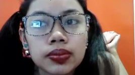 Nerdy asian with big glossy lips
